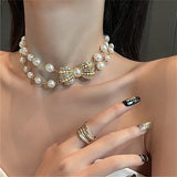 Pearl Bowknot Pendant Necklace Rhinestone Temperament