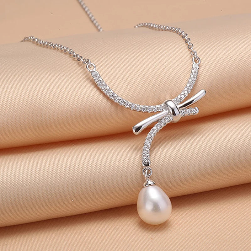 Rice Freshwater Pearl Pendant Necklace Sterling Silver Bowknot Jewelry