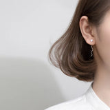 925 Sterling Silver CZ Star Dangle Earrings