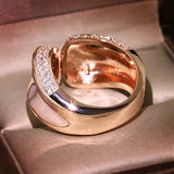 Geometric Cross Curved Rose Engagement Ring