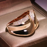 Geometric Cross Curved Rose Engagement Ring