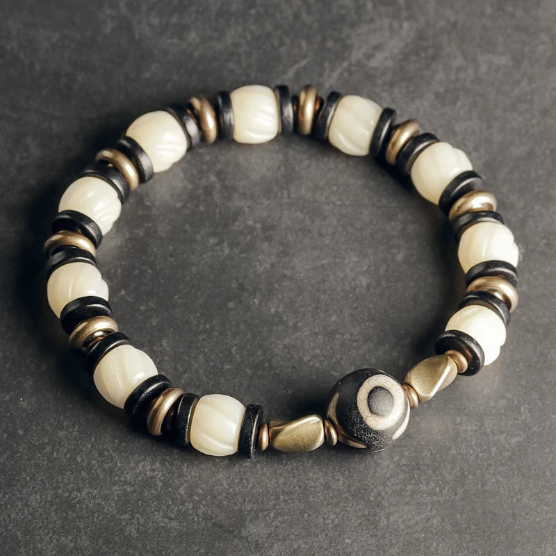 Natural Carved Animal Bone Bracelet with Ebony Spacer and Tibetan Evil Eyes Bead