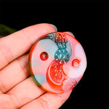 Hand-carved Chicken Blood Jade Tai Chi Pendant