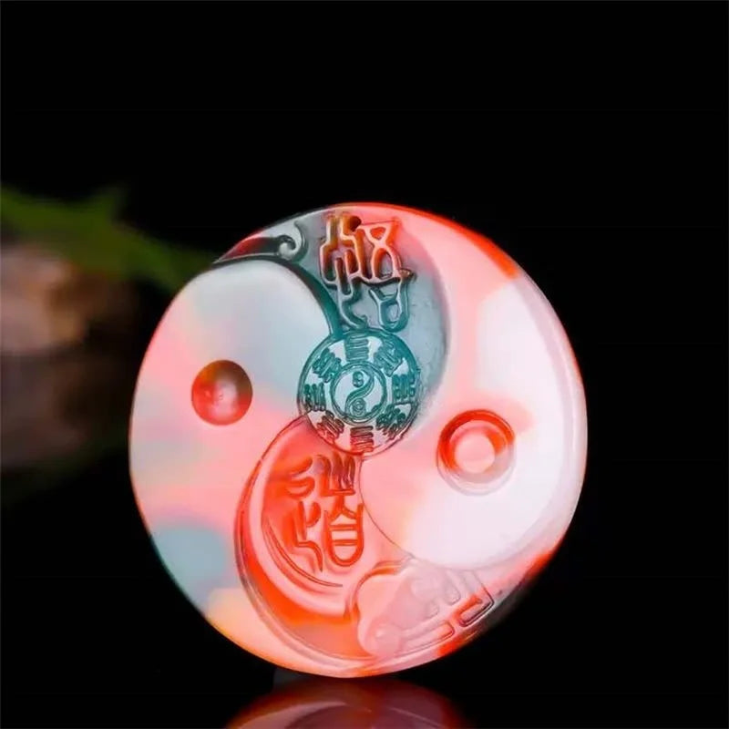 Hand-carved Chicken Blood Jade Tai Chi Pendant