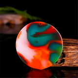 Hand-carved Chicken Blood Jade Tai Chi Pendant