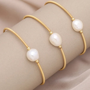 Freshwater Pearl Bracelet: Rice Pearls Charm Bracelet Elegant Jewellery