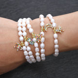 Freshwater Pearl Eye Hand Pendant Bracelet with Cubic Zirconium