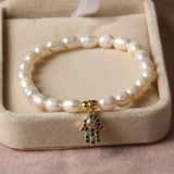 Freshwater Pearl Eye Hand Pendant Bracelet with Cubic Zirconium