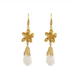 Hetian Jade Plum Blossom Magnolia Earrings Retro Court Romantic Silver Jewelry