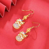 Natural Hetian Jade Enamel Lion Dancing Earrings with Ancient Craftsmanship