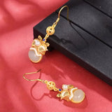 Natural Hetian Jade Enamel Lion Dancing Earrings with Ancient Craftsmanship