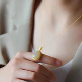 Natural Hetian chalcedony drop-shaped pendant necklace