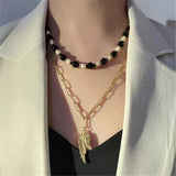Vintage Natural Pearl Necklace with Feather Pendant
