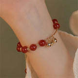 Red Agate Beads Bracelet with Bell Pendant