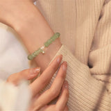 Green Aventurine Bracelet with 925 Silver Bell Pendant