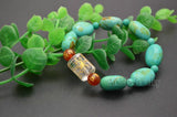 Turquoise Flat Oval Bead Stretch Bracelet with Lucky Beads