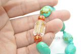 Turquoise Flat Oval Bead Stretch Bracelet with Lucky Beads
