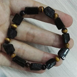 Raw Tourmaline Hematite Hamsa Bracelet