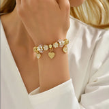 Stainless Steel Snake Chain Bracelet with Heart Flower Charm