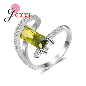 Arrival Curve Rings with Olive CZ 925 Sterling Silver Needle
