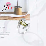 Arrival Curve Rings with Olive CZ 925 Sterling Silver Needle