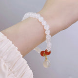 Bell Natural Chalcedony 6mm Agate Beaded Bracelet