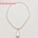 AA 5-6MM Rice Pearl Necklace 925 Sterling Silver Clasp