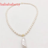 AA 5-6MM Rice Pearl Necklace 925 Sterling Silver Clasp