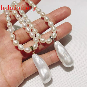 AA 5-6MM Rice Pearl Necklace 925 Sterling Silver Clasp