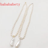 AA 5-6MM Rice Pearl Necklace 925 Sterling Silver Clasp