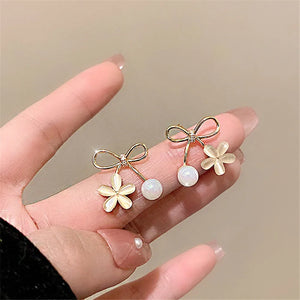 Vintage Pearl Bow Earrings Women'S Ins Style Sense Cat'S Eye Flower Earrings