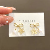 Vintage Pearl Bow Earrings Women'S Ins Style Sense Cat'S Eye Flower Earrings