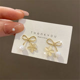 Vintage Pearl Bow Earrings Women'S Ins Style Sense Cat'S Eye Flower Earrings