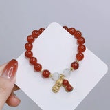 Red Agate Cat's Eye Beaded Strand Bracelet with Peanut Charm