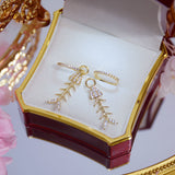 14k CZ Fish Bone Ear Buckle Earrings
