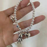 Women's Stainless Steel Beaded Bracelet with Heart Bear Pendant