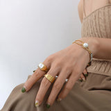 Women's Stainless Steel CZ Pearl Buckle Bracelet