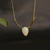 Diamond-Studded Hetian Chalcedony Elk Pendant Necklace