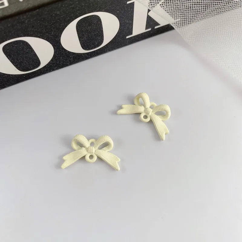 100pcs Rubber Paint Geometry Alloy Bow Charms Earring/Garment Accessory