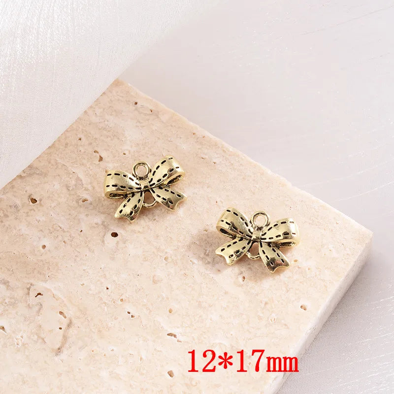 60pcs Cartoon Bowknot Bow Alloy Charms DIY Jewelry Accessory