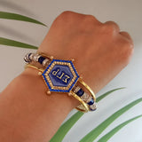 Greek Yellow Bangle  SGR LOGO