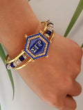 Greek Yellow Bangle  SGR LOGO