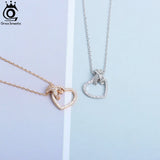 925 Sterling Silver Bowknot Necklace with Zirconia Heart Pendant