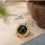 Dark Green Chalcedony Pendant Necklace with Silver Inlay