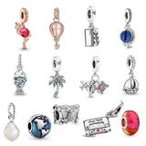 Sterling Silver Bracelet with Flamingo Pendant & Cinema Globe Beads