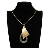Irregular Long Geometric Sweater with Exaggerated Necklace