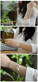 925 Sterling Silver Open Bracelet with 4 Daisy Charms