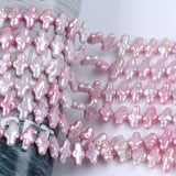 Pink 10*14mm Cross Freshwater Pearl Strand