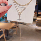NC710 18KT Double Ring Tassel Pendant Necklace