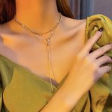 NC710 18KT Double Ring Tassel Pendant Necklace
